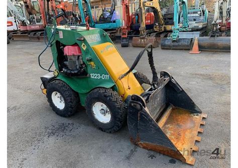 electric stand on skid steer|used stand behind skid steer.